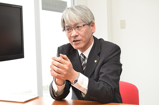 写真：塚本行政書士